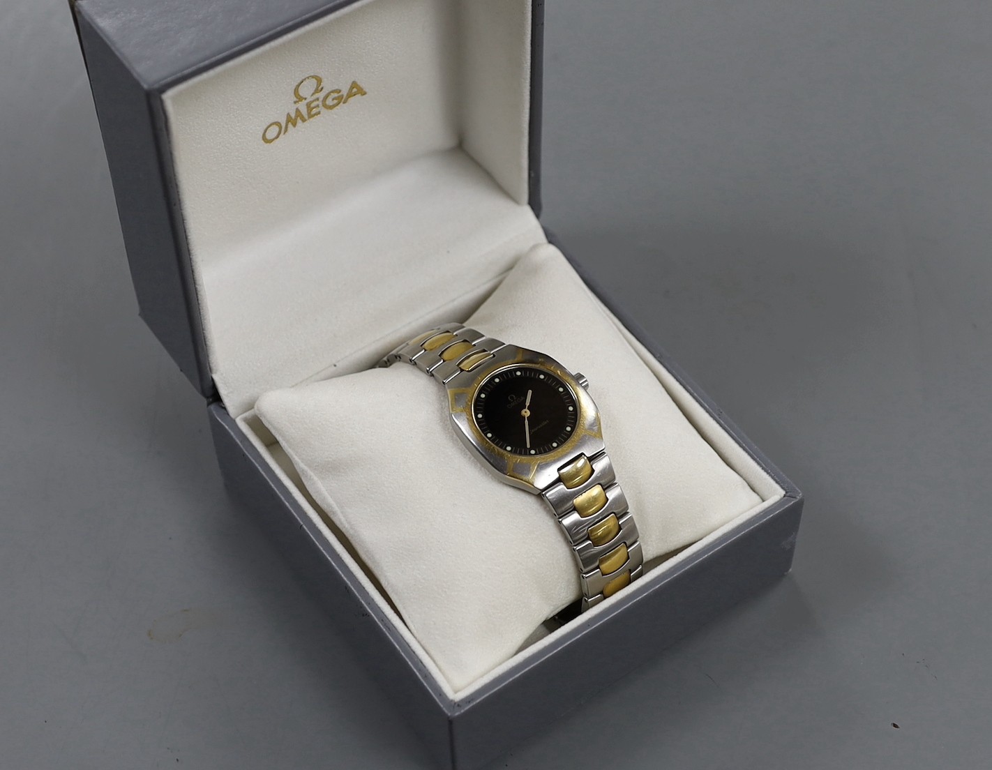 A gentleman's modern steel and gold plated Omega Seamaster quartz wrist watch, case diameter 32mm, with box, no papers.